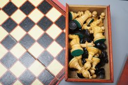 A wooden Staunton chess set and board