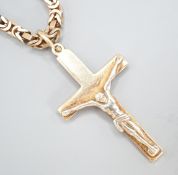 A 9ct gold crucifix pendant, 37mm, on a 9ct gold chain, 47cm,gross weight 28.6 grams.