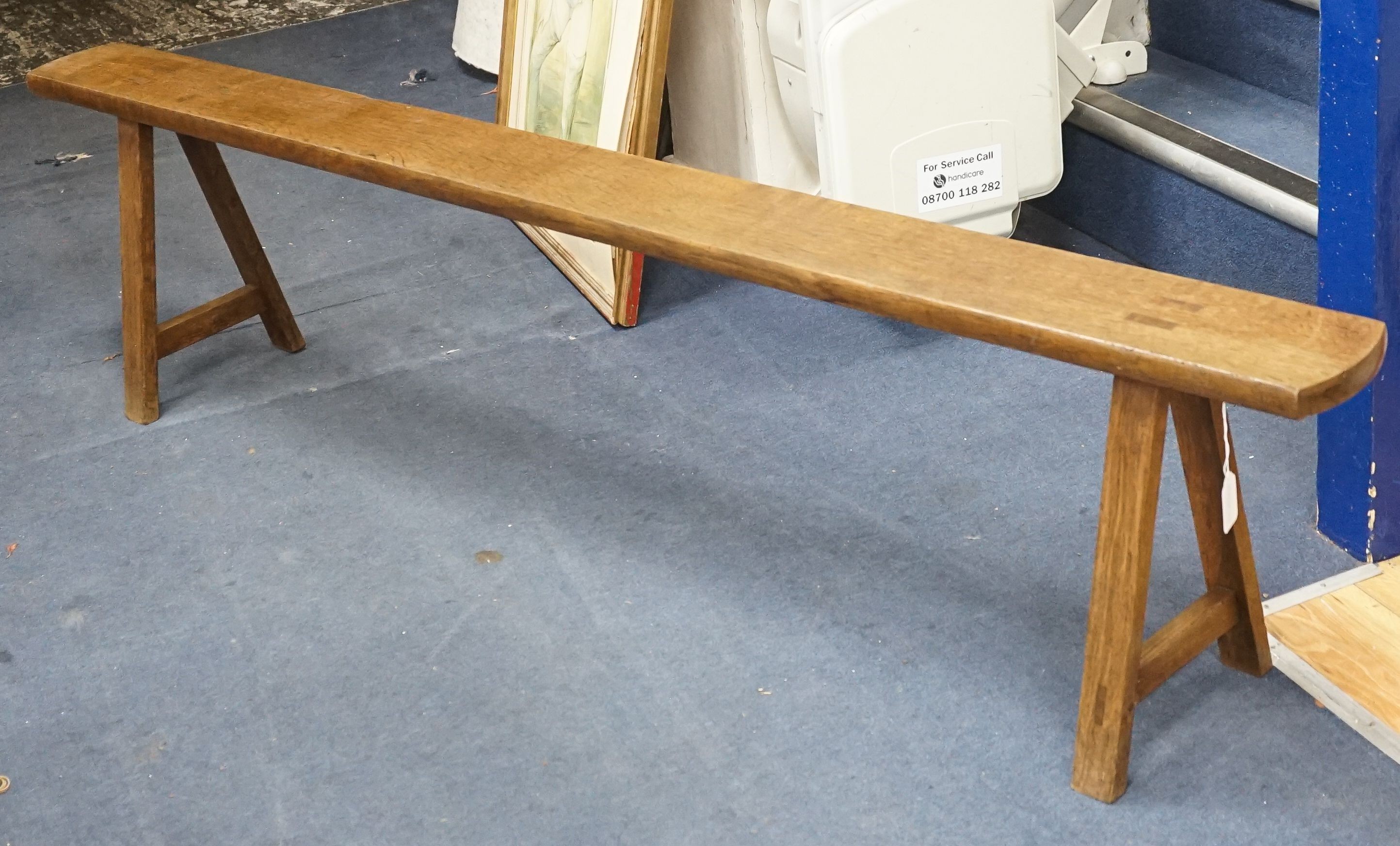 A 19th century French oak bench seat, length 203cm, depth 28cm, height 46cm