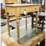 A Victorian golden oak side table, with single drawer, turned and fluted legs on brass castors,