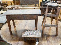 An 18th century oak low table, width 74cm, height 32cm, a carved oak foot stool and an Edwardian oak