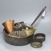 A group of assorted metalware including a copper pan, a brass stirrup, a pewter mug filled with