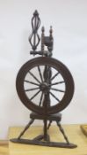 A 19th century beech and ash spinning wheel, 109 cm high