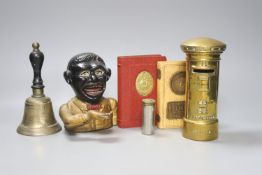 Little Joe cast iron money bank, three other money banks and a hand-bell 17cm