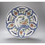 An 18th century Delft polychrome dish 35cm