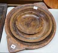 An early 19th century sycamore shallow bowl with lug handles, 64cm and two other bowls, 40cm and