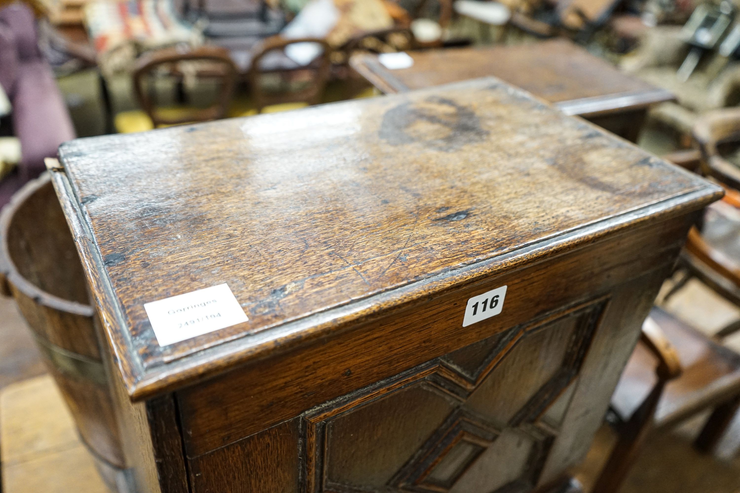 A late 17th century oak spice cupboard, with geometric panelled door enclosing five small drawers, - Image 2 of 6