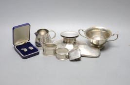 A Scottish silver mounted oval inkwell, 13.2cm, a small silver bowl, silver vesta case, silver