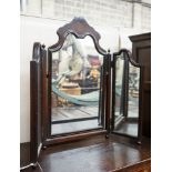 A 1930's walnut triptych dressing table mirror, height 75cm