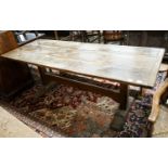 A 17th century style oak refectory table, width 191cm, depth 74cm, height 73cm