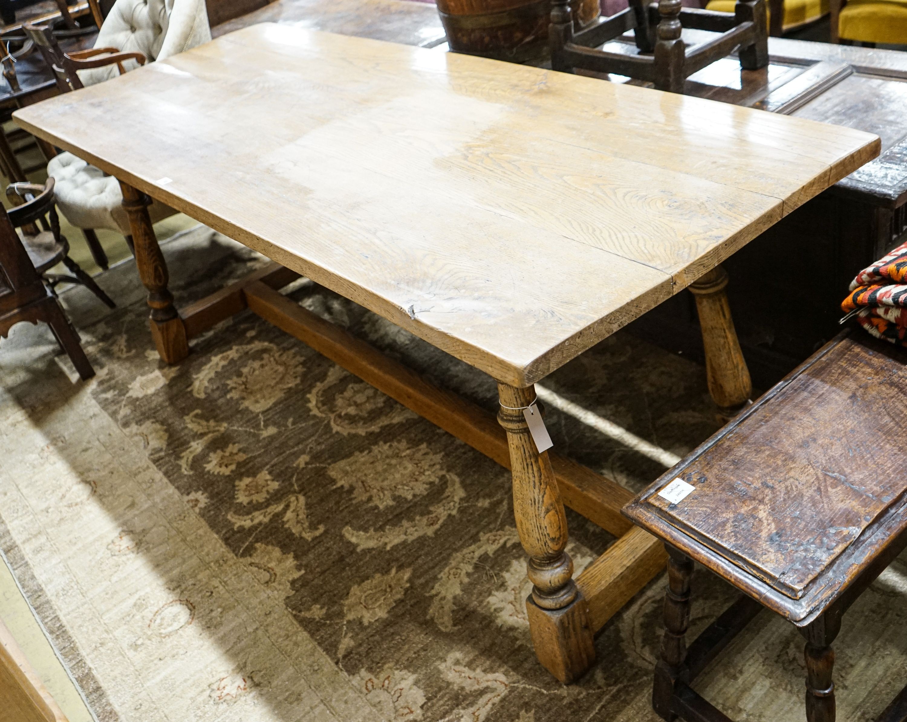 An 18th century style rectangular oak refectory dining table, length 202cm, depth 78cm, height 80cm