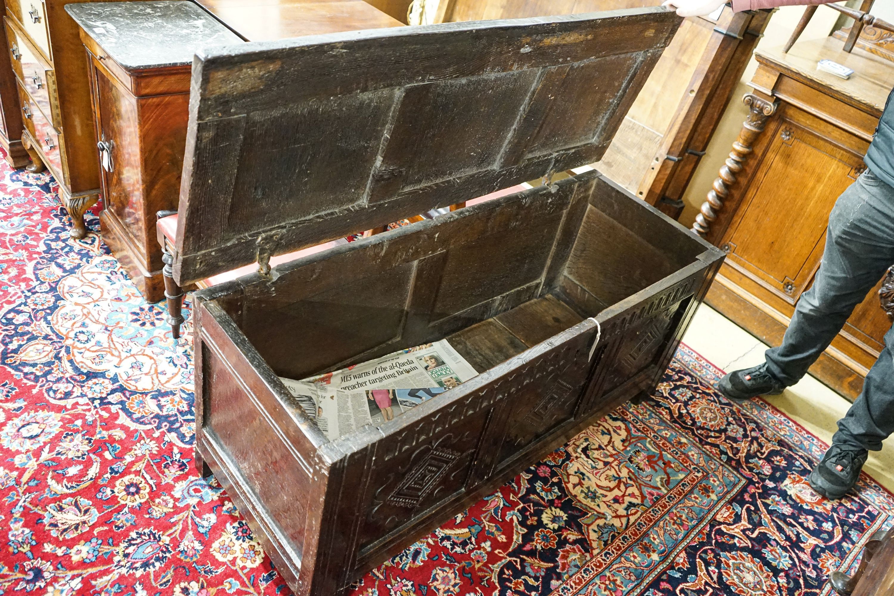 A late 17th/early 18th century carved and panelled oak coffer with hinged lid, width 136cm, depth - Image 4 of 7