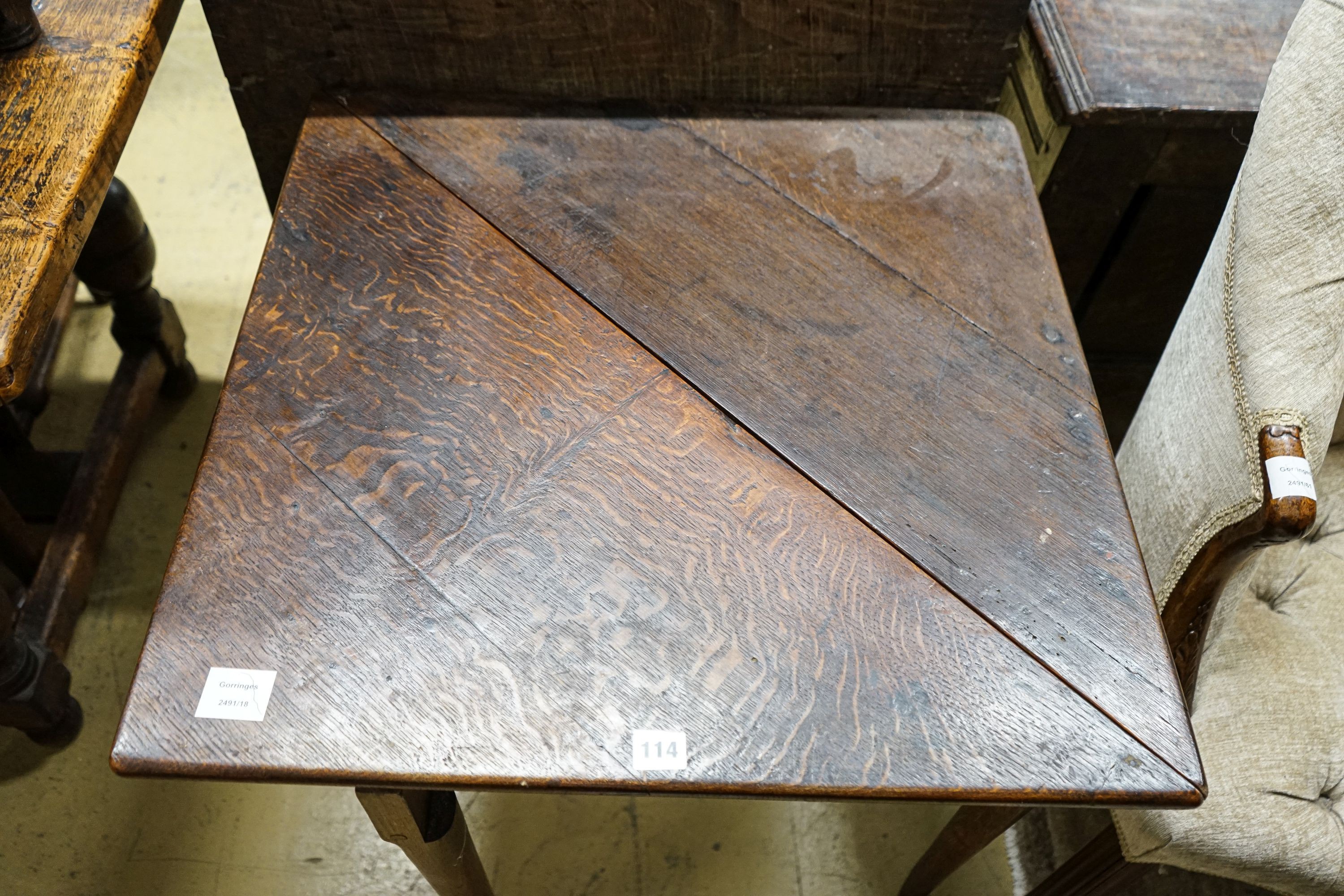 A George II oak folding top tea table, with triangular flap, on turned legs and pad feet, 64cm - Image 2 of 3
