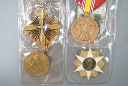 Four U.S. forces unnamed military medals to include -a USAF DFC, NDSM, Vietnam Campaign Medal and