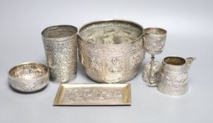 A group of Indian items including a white metal bowl embossed with animals, diameter 14.2cm, cream