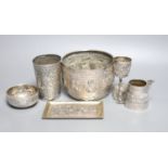 A group of Indian items including a white metal bowl embossed with animals, diameter 14.2cm, cream