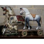 A Victorian carved and painted wood rocking horse, lacking underframe, length 77cm and two painted