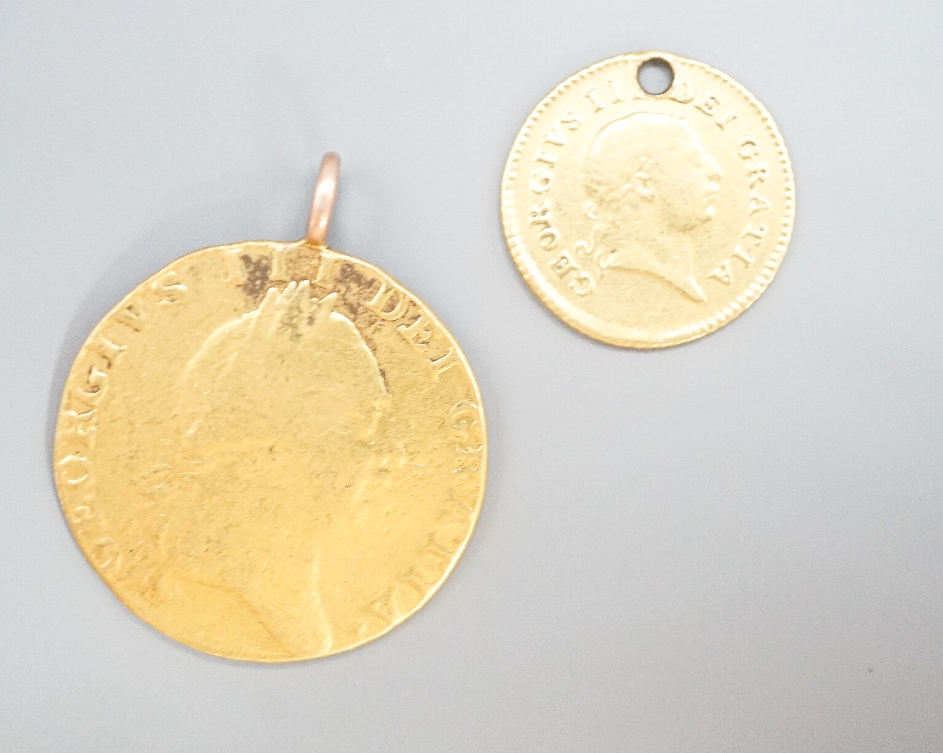 A George III 1788 gold guinea, now with pendant loop and an 1804 gold one third guinea(hole). - Image 2 of 4