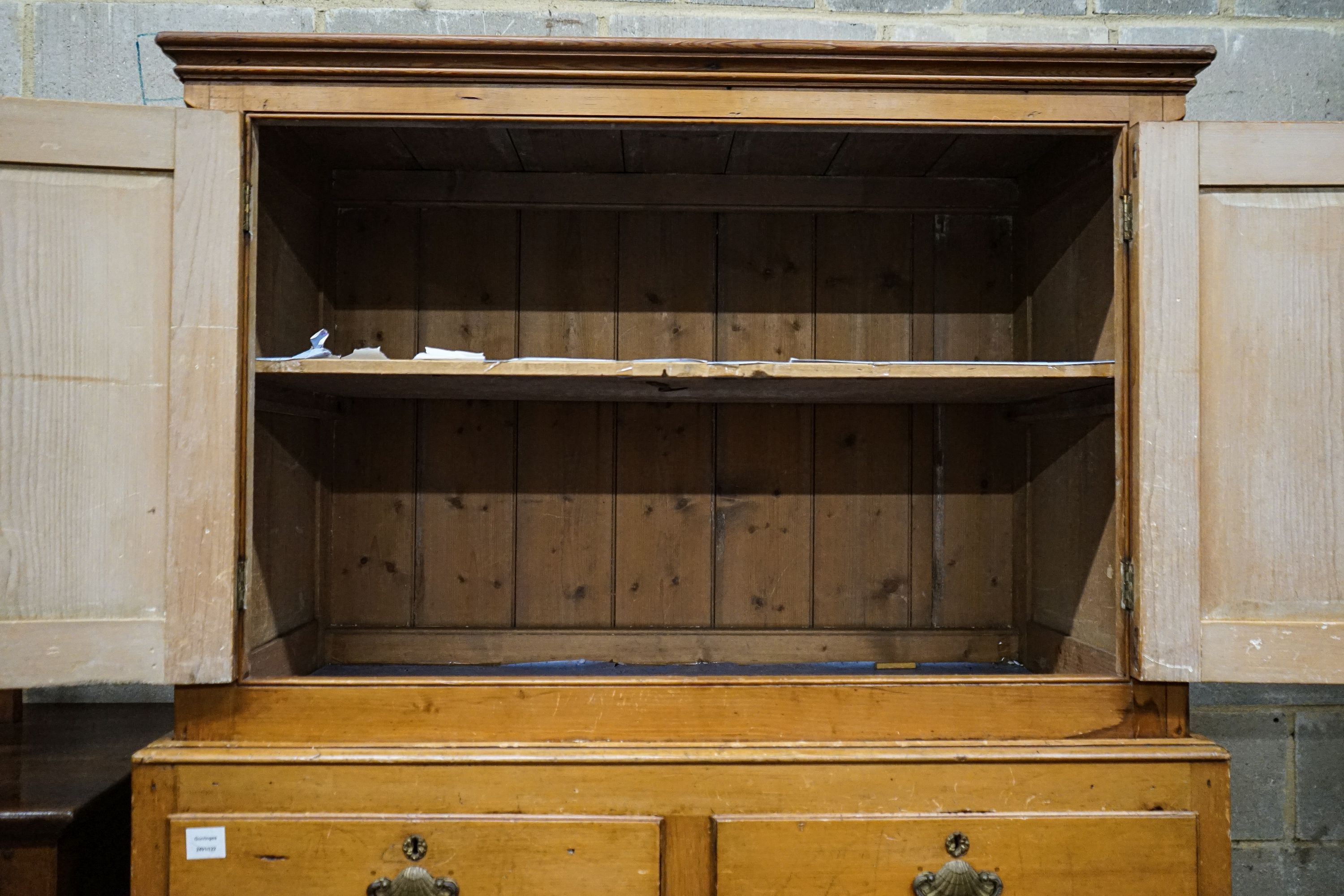 An early Victorian pine kitchen cabinet, with two panelled doors over two short and three long - Image 3 of 3