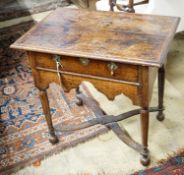 An early 18th century oak lowboy, with single drawer and saltire stretcher, width 67cm, depth