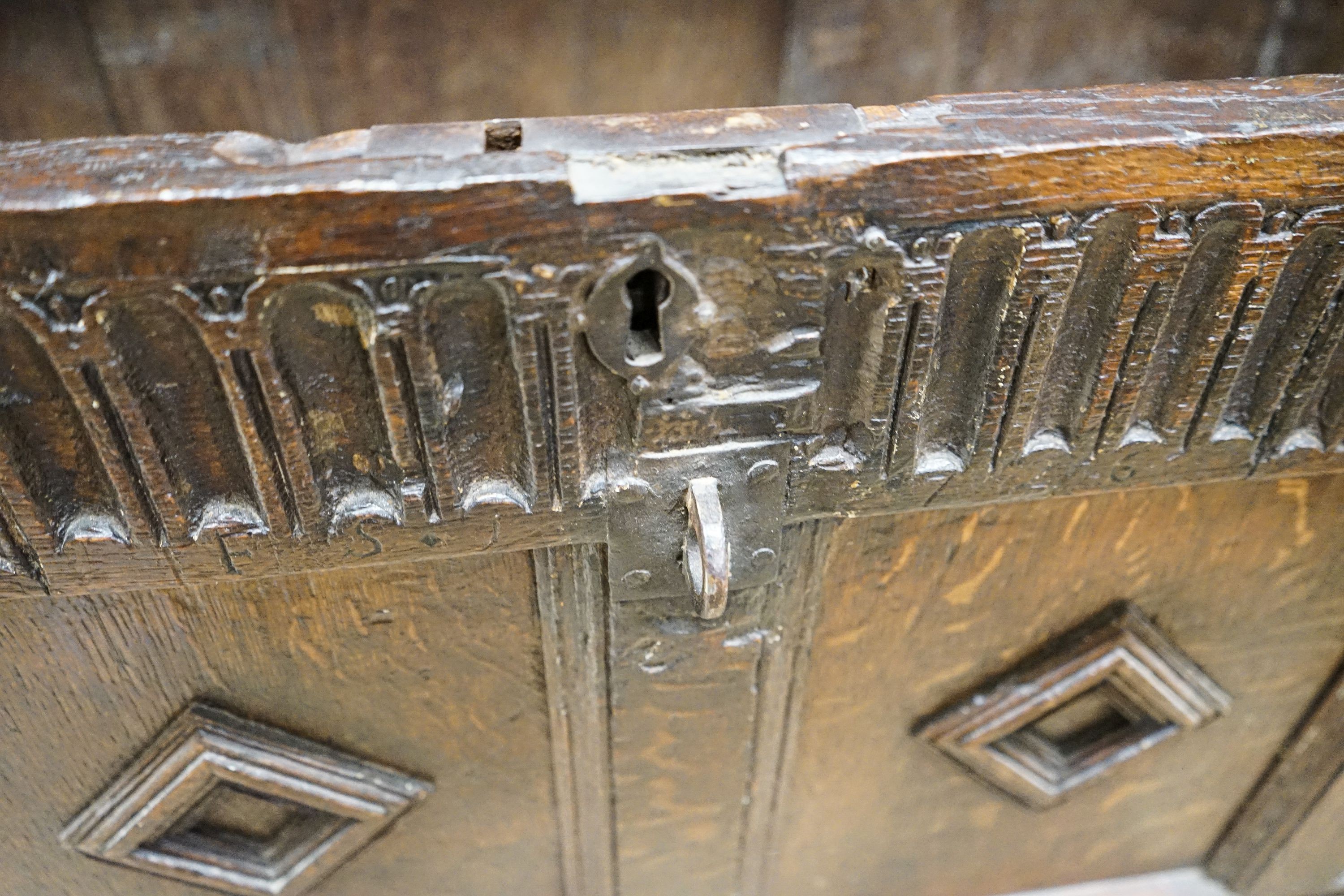 A late 17th century oak coffer, with four panel top and carved front, length 151cm, depth 58cm, - Image 4 of 6