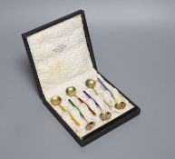 A cased set of six Norwegian gilt white metal and enamel coffee spoons.