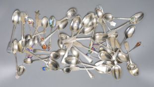 A mixed collection of assorted mainly silver and white metal tea and souvenir spoons, a Georgian