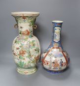 A Japanese porcelain bottle vase and a large Satsuma pottery vase (restoration) 39cm (2)