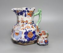 A graduated set of eight Mason's floral Imari pattern ironstone hydra jugs, c.1820-30, largest