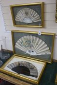 An early 19th century had tinted paper and ebony fan and two late 19th century ivory silk and bone