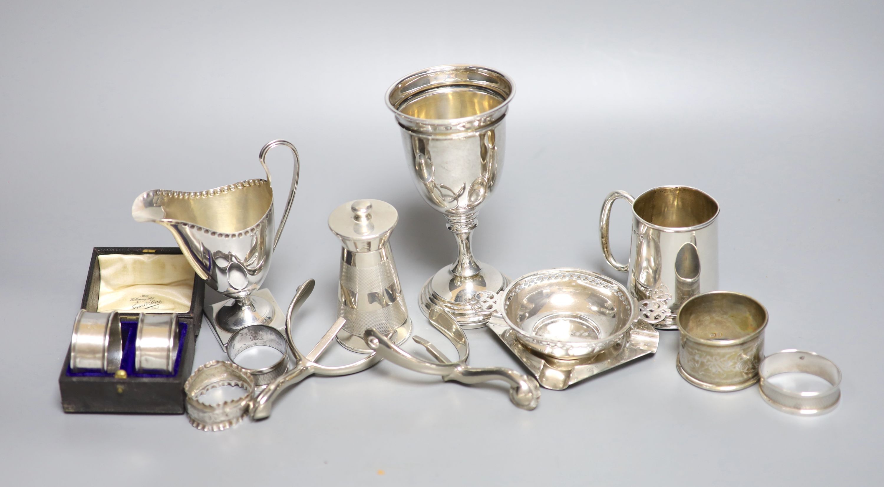 Mixed small silver lot to include a pepper mill, cream jug, christening mug, goblet, etc and a
