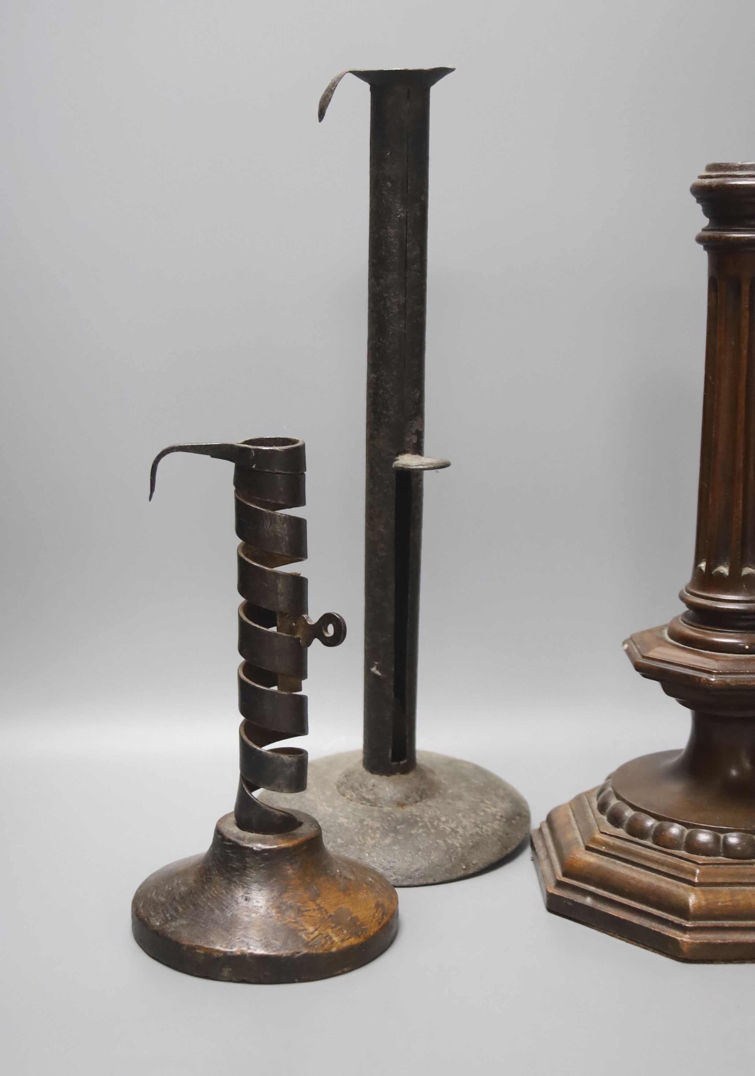 A wrought iron taperstick, a pair of iron telescopic candlesticks, a spiral candlestick, all - Image 2 of 4