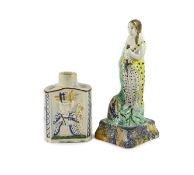 A Staffordshire Prattware pearlware tea caddy and figure of Flora, c.1790,the tea caddy moulded with