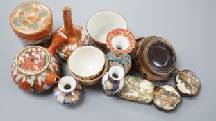 A group of Japanese small or miniature Kutani and Imari vessels and three Satsuma pottery mounted