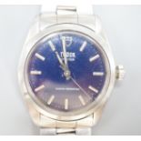 A gentleman's stainless steel Tudor Oyster manual wind wrist watch, with blue dial, on Rolex