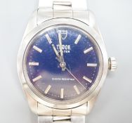 A gentleman's stainless steel Tudor Oyster manual wind wrist watch, with blue dial, on Rolex