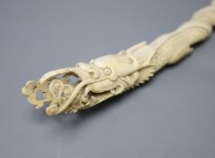 An Indonesian ivory carving of a dragon, first half of 20th century 52cmAn Indonesian ivory