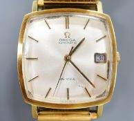 A gentleman's steel and gold plated Omega De Ville automatic wrist watch, on associated flexible