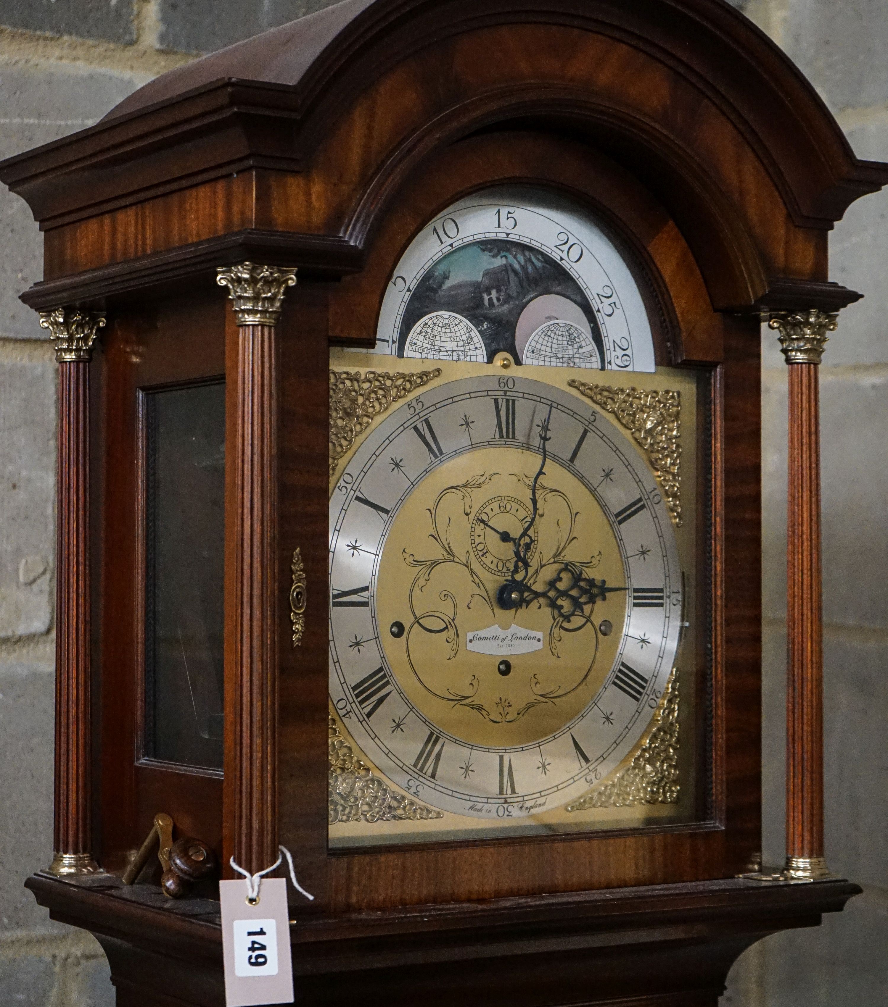A modern mahogany longcase clock by Comitti London eight day, striking and chiming movement, brass