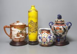 A Satsuma yellow ground vase, a Kutani twin handled cup and cover, a Fukugawa Imari jug and an Imari