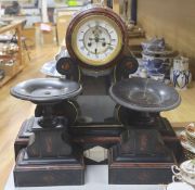 A 19th century Victorian slate clock garniture, the movement with visible Brocot escapement no key