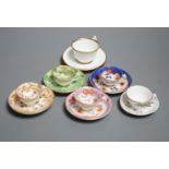 Five Staffordshire miniature teacups and saucers, possibly Alcock and a Hicks & Meigh miniture