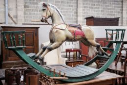 A large Victorian style painted rocking horse with end seats, length 240cm, height 132cm