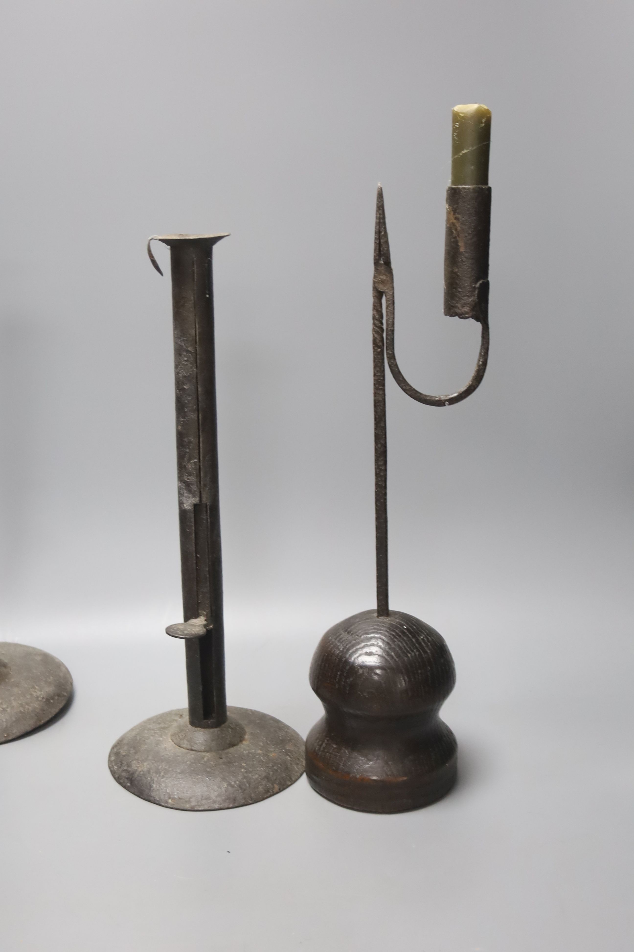 A wrought iron taperstick, a pair of iron telescopic candlesticks, a spiral candlestick, all - Image 4 of 4