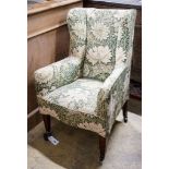 A George III mahogany child's armchair, with square tapered legs fitted brass castors, width 49cm,