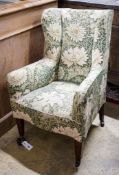 A George III mahogany child's armchair, with square tapered legs fitted brass castors, width 49cm,