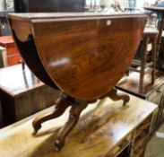 A Victorian figured walnut oval Sutherland table on turned supports and quadripartite scrolled legs,