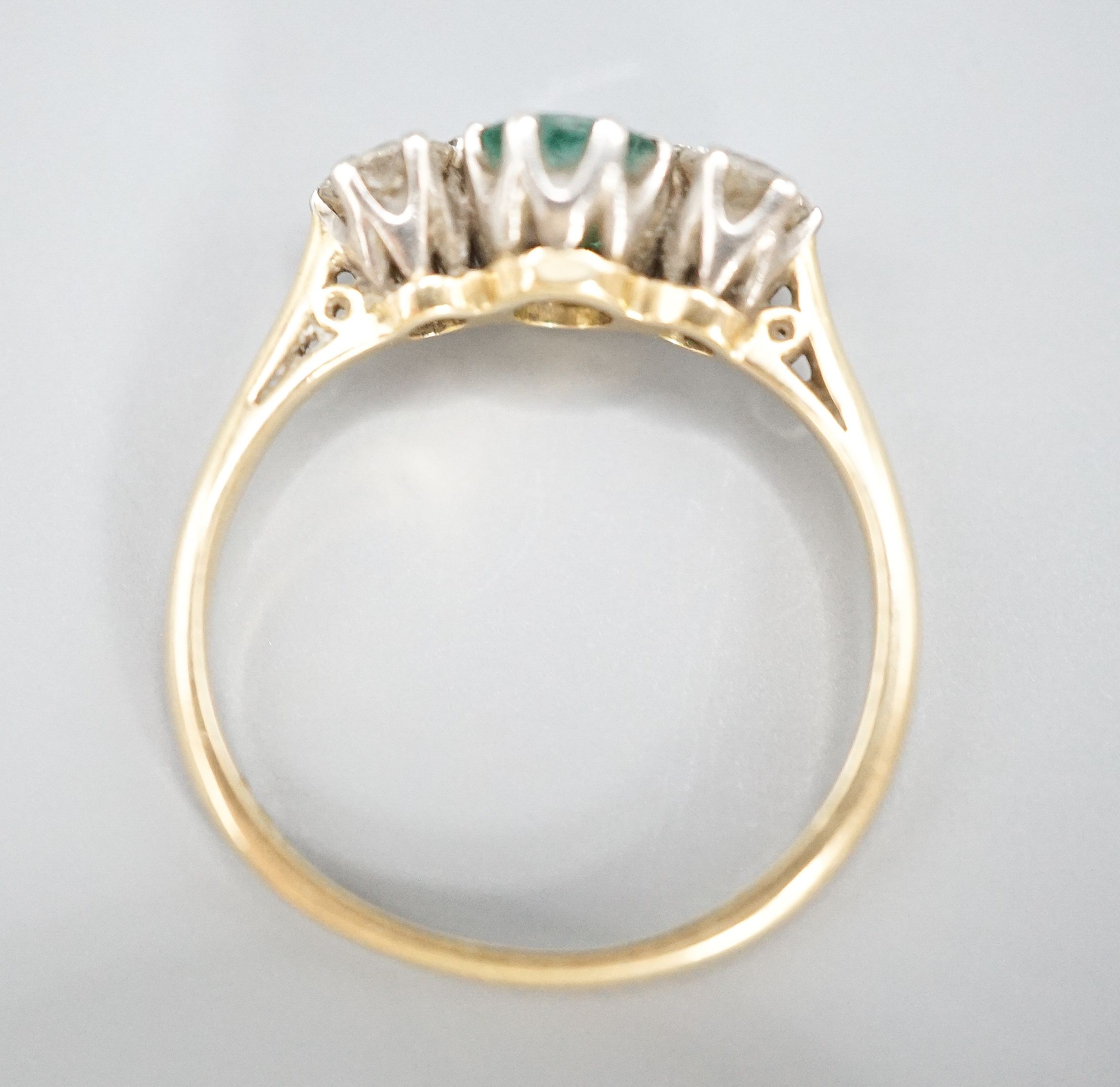 An 18ct and plat, emerald and diamond set three stone ring, size K, gross weight 2.3 grams. - Image 4 of 5