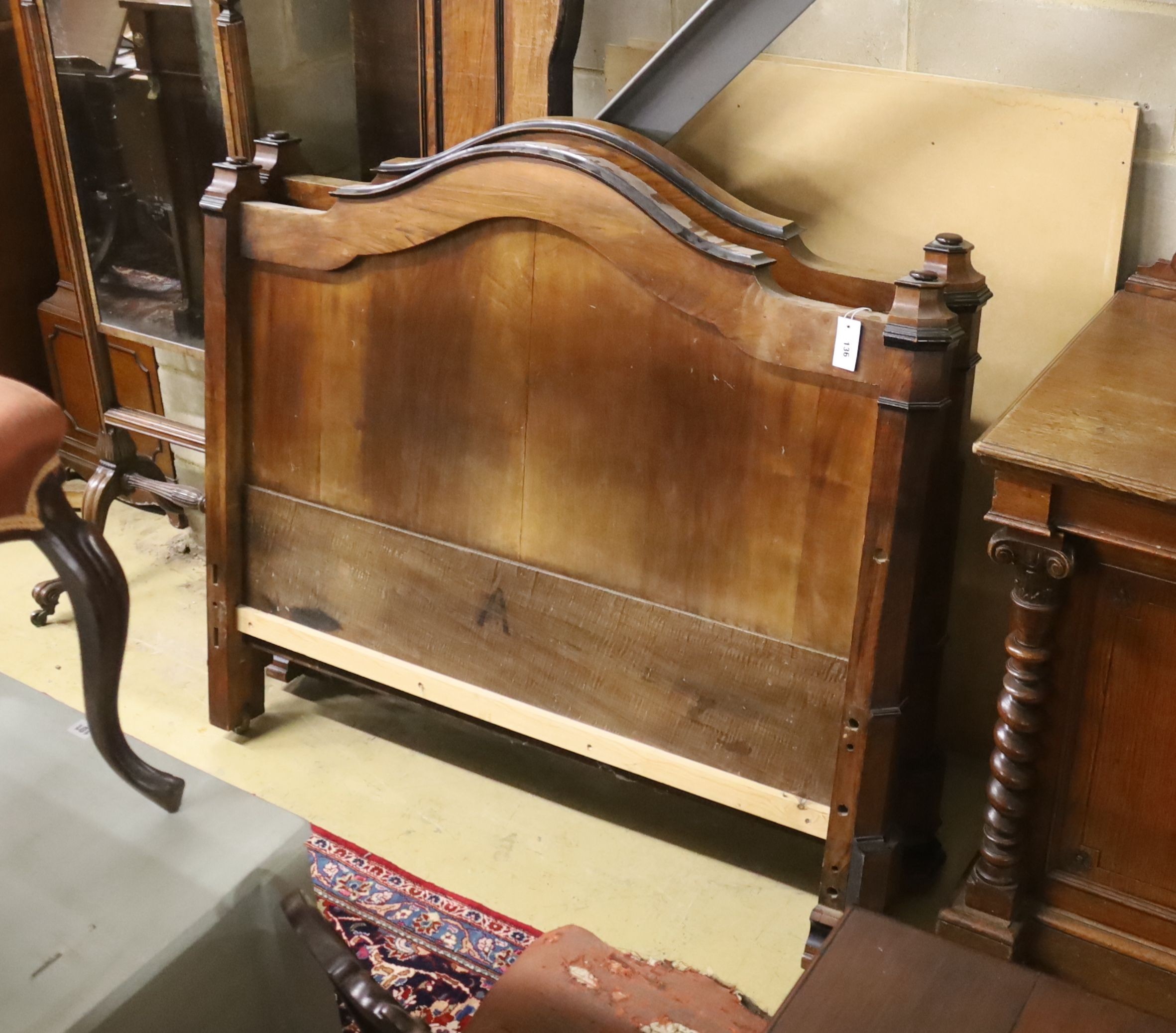 A 19th century French part ebonised walnut double bed frame, width 130cm