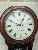 A Victorian mahogany drop dial wall clock, with twin fusee movement, and circular white painted